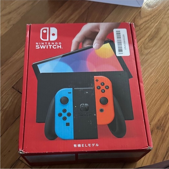 Nintendo Other - Nintendo Switch Console with Vibrant Blue and Red Controllers. Brand new